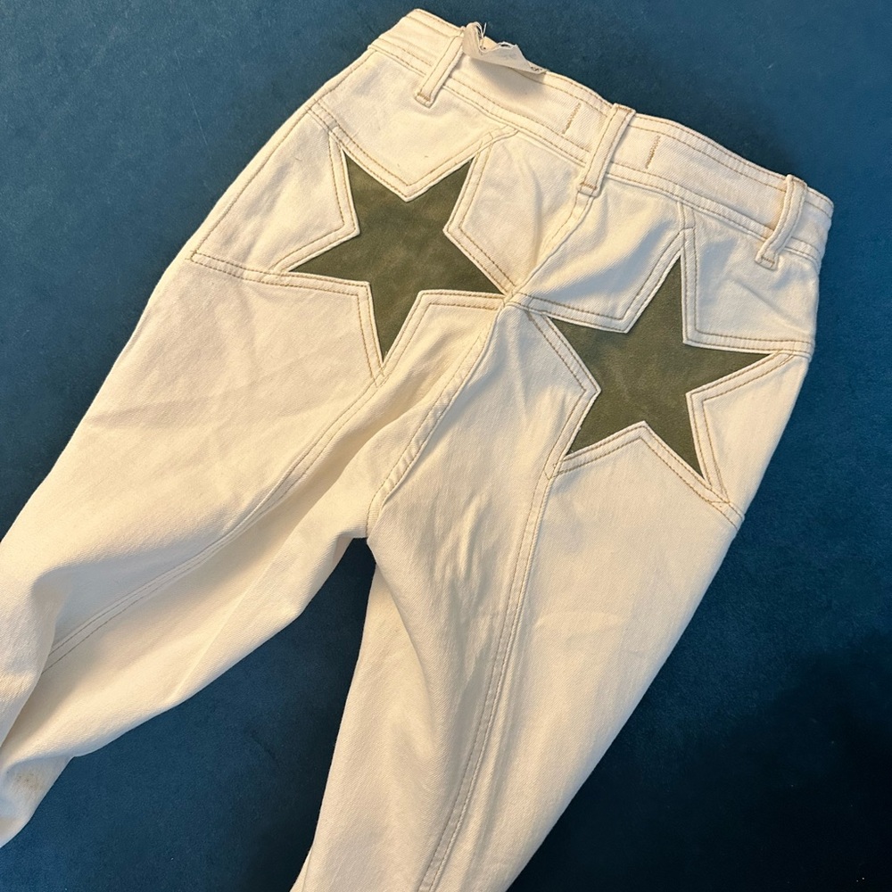 Star bottom flared white pants